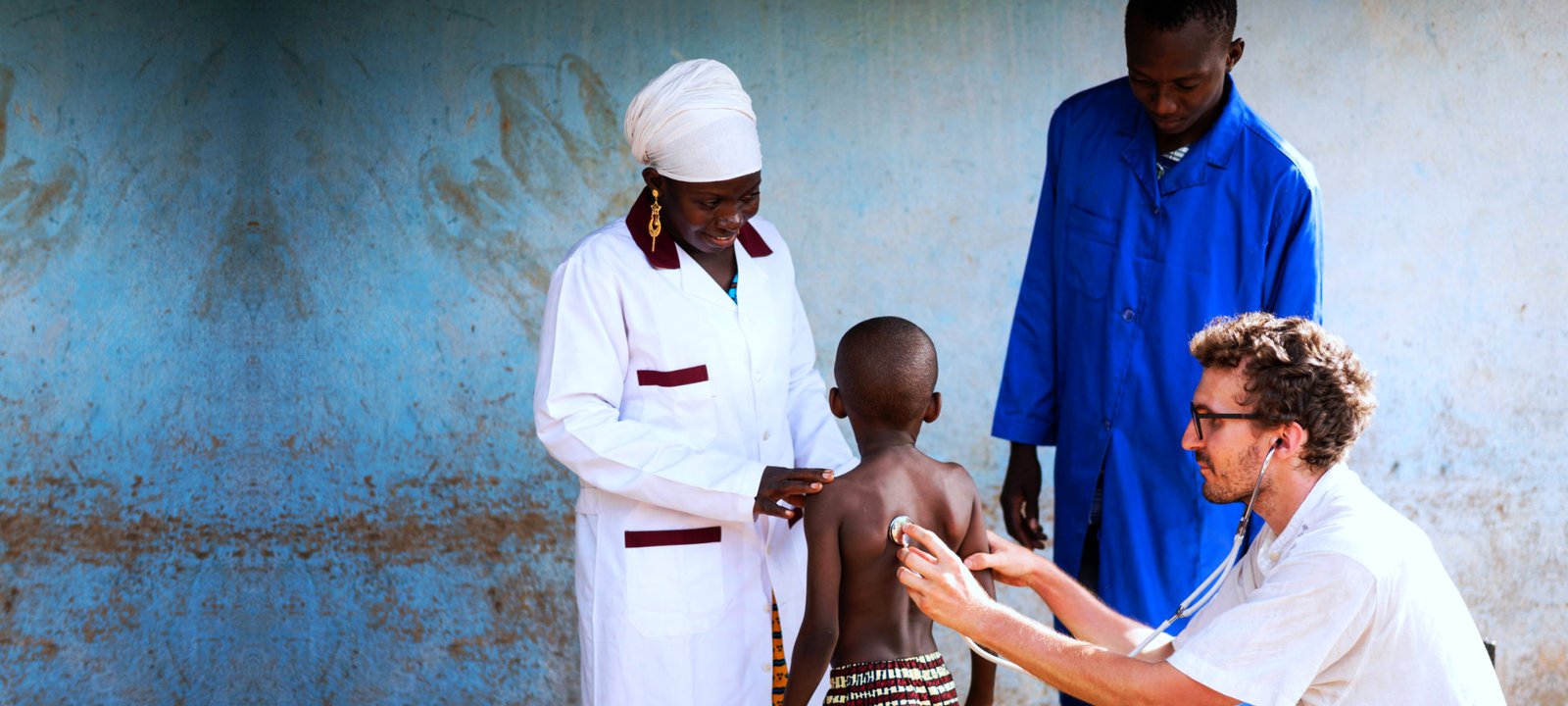 doctor checking up to his clients